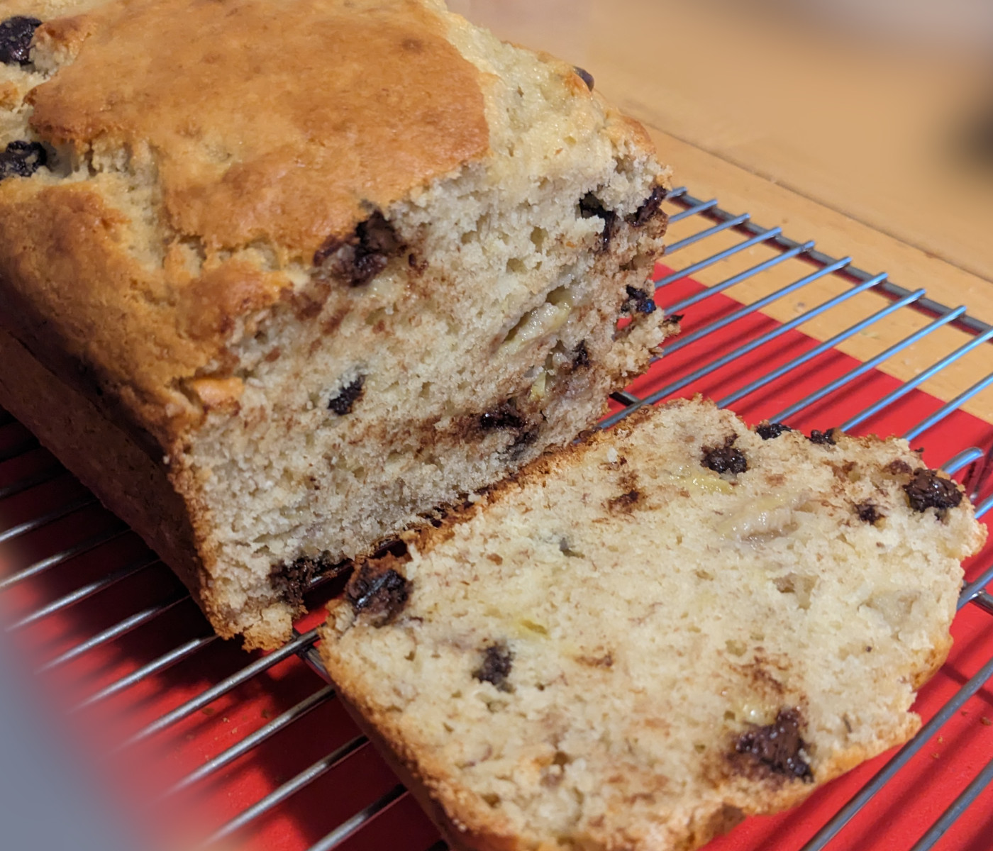 picture of the finished loaf with a slice taken off of one end to show the inside